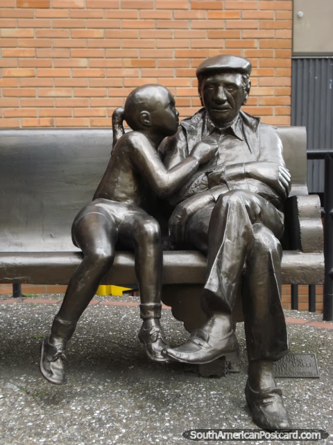 Girl and grandfather statue sitting on seat I saw in Medellin. (480x640px). Colombia, South America.