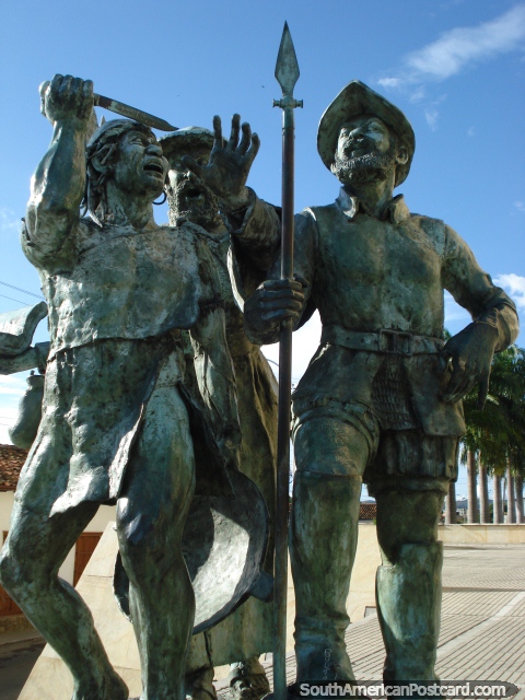 Monument in Bucaramanga, 3 men, one with book, one with knife, one with spear. (480x640px). Colombia, South America.