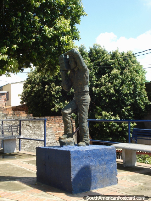 Monument in Cucuta, man carrying bricks. (480x640px). Colombia, South America.