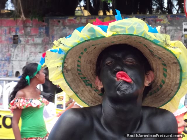 Black face and red lips, a mumbo jumbo man at Barranquilla Carnival. (640x480px). Colombia, South America.