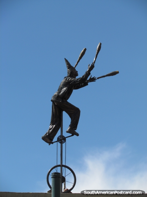 Juggling on a unicycle statue in La Candelaria in Bogota. (480x640px). Colombia, South America.