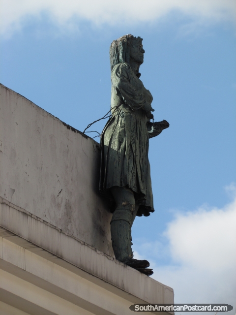 Sculpture of woman figure on building in historical Bogota. (480x640px). Colombia, South America.