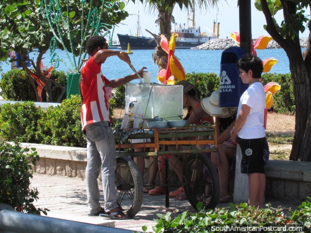 Cold and icy lemonade served from a glass tank on Santa Marta's waterfront. (640x480px). Colombia, South America.