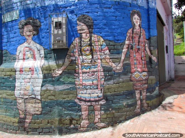 3 mujeres indígenas, mural en la pared en una esquina de ladrillo doblada en Bogotá. (640x480px). Colombia, Sudamerica.