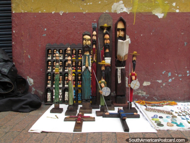 Wooden religious figures for sale on the sidewalk in Bogota. (640x480px). Colombia, South America.