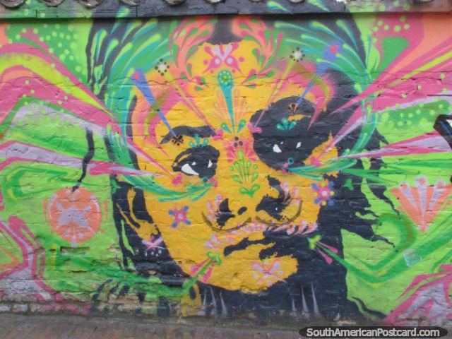 Nice colorful mural depicting a face in La Candelaria in Bogota. (640x480px). Colombia, South America.