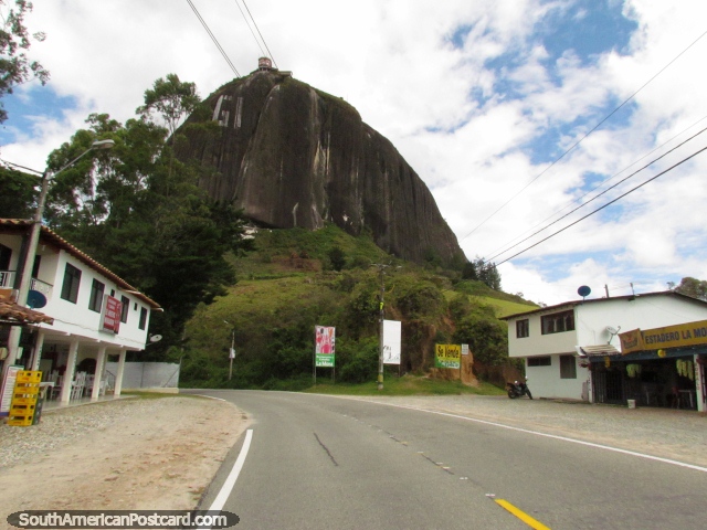 View of the Rock of Guatape from the road while traveling by jeep back to Penol. (640x480px). Colombia, South America.