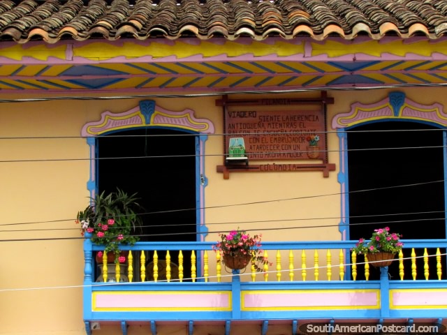 Colorful balconies and flowerpots around the plaza in Filandia. (640x480px). Colombia, South America.