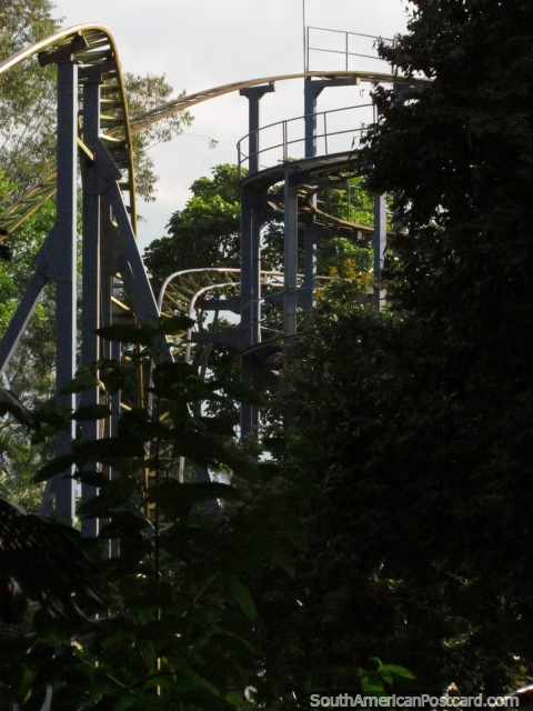 The roller coaster tracks high among the trees at the Coffee Park in Armenia. (480x640px). Colombia, South America.
