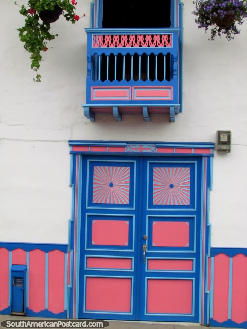 Matching pink and blue door, balcony and skirting in Salento. (480x640px). Colombia, South America.