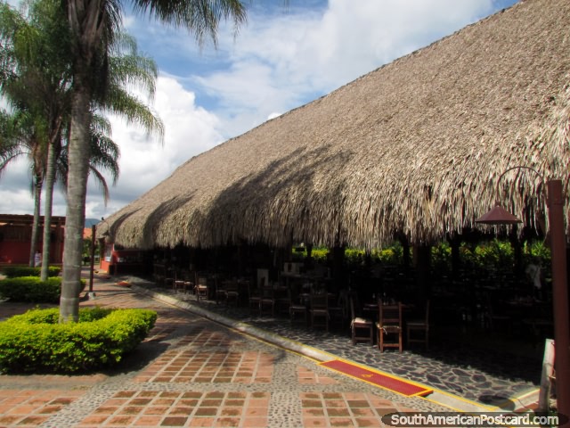 The huge dining room under a thatched roof at Decameron Panaca in Armenia. (640x480px). Colombia, South America.