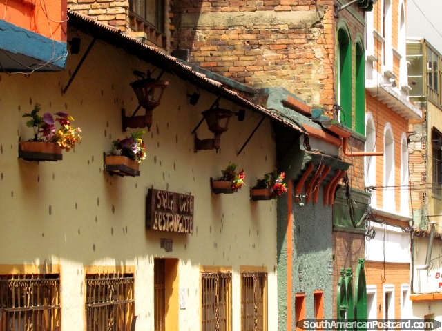 Facades with flower baskets in La Candelaria, Bogota. (640x480px). Colombia, South America.