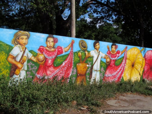Colorful mural of dancers in traditional clothing in Valledupar. (640x480px). Colombia, South America.