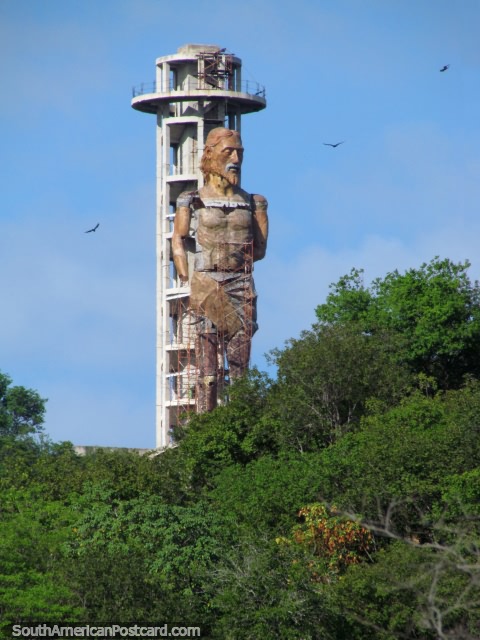 Huge monument of Jesus and a lookout tower overlooking the river in Valledupar. (480x640px). Colombia, South America.