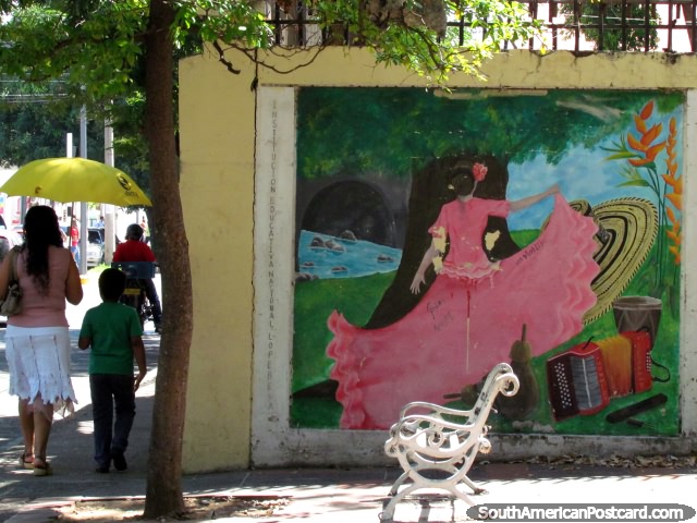 Woman in a pink dress, mural in Valledupar, a woman with an umbrella walks past. (640x480px). Colombia, South America.
