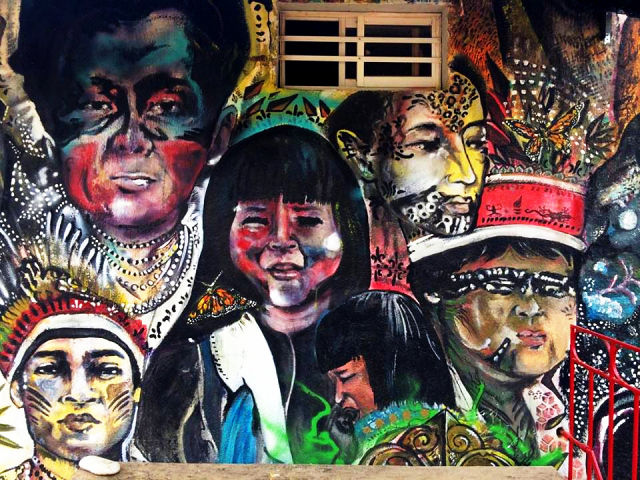 Street art in Taganga, a bunch of indigenous and assorted faces, great artist! (640x480px). Colombia, South America.