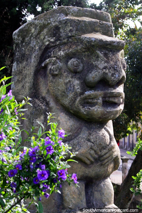 Stone figure, Pre-Columbian in the gardens at Republica Forest (Bosque de la Republica) in Tunja. (480x720px). Colombia, South America.