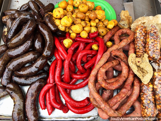 Blood sausage, red sausage and more plus potatoes, crackling and corn, street breakfast in Tunja. (640x480px). Colombia, South America.