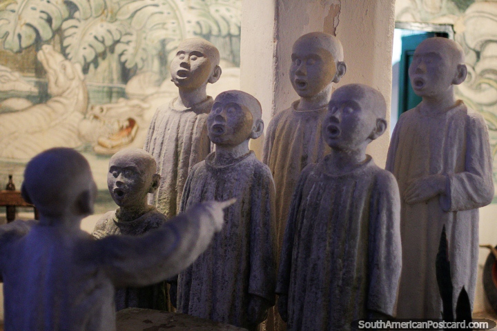Group of bald choir boys made of cement, sculptured by Luis Alberto Acuna in Villa de Leyva. (720x480px). Colombia, South America.