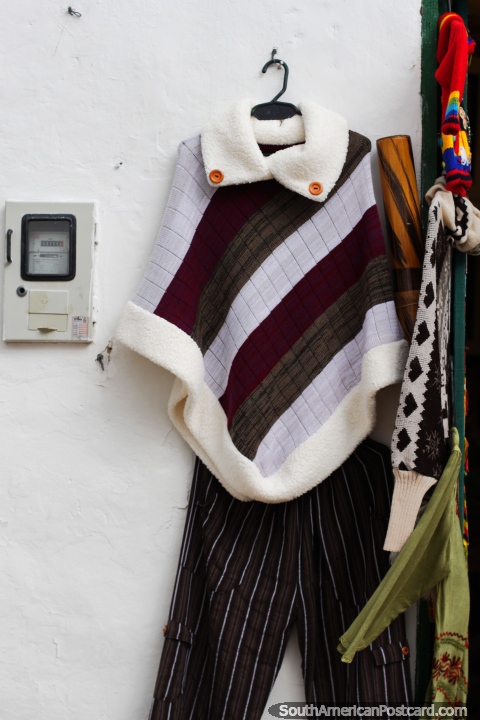 Smart Andean shawl with pants, a nice outfit for sale in Villa de Leyva. (480x720px). Colombia, South America.