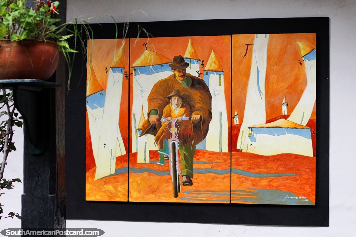 Man and boy on a bicycle, painting by Fernando Botero (2016) at the cultural center in Villa de Leyva. (720x480px). Colombia, South America.