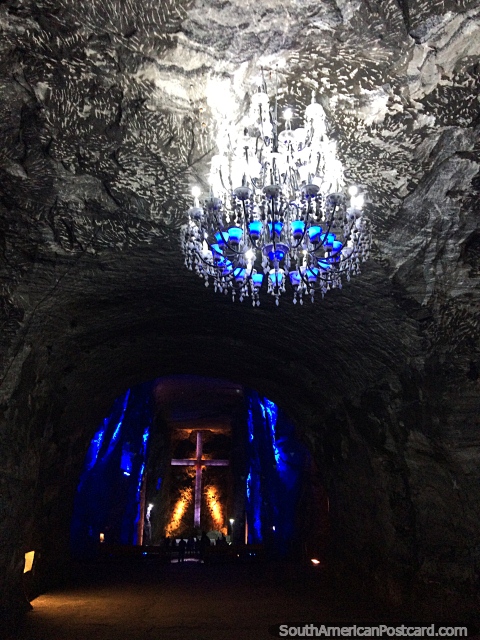 The striking chandelier and a tunnel leading through to the main chamber of the Salt Cathedral in Zipaquira. (480x640px). Colombia, South America.