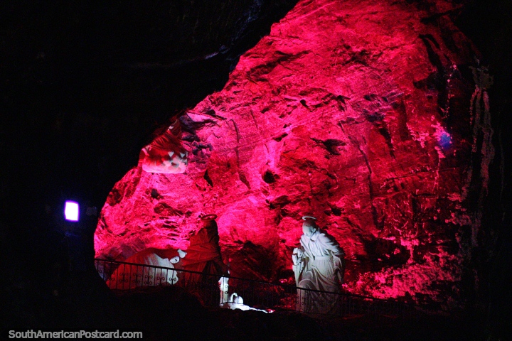 The Holy Family in red light, the changing colors of the light show at the Salt Cathedral in Zipaquira. (720x480px). Colombia, South America.
