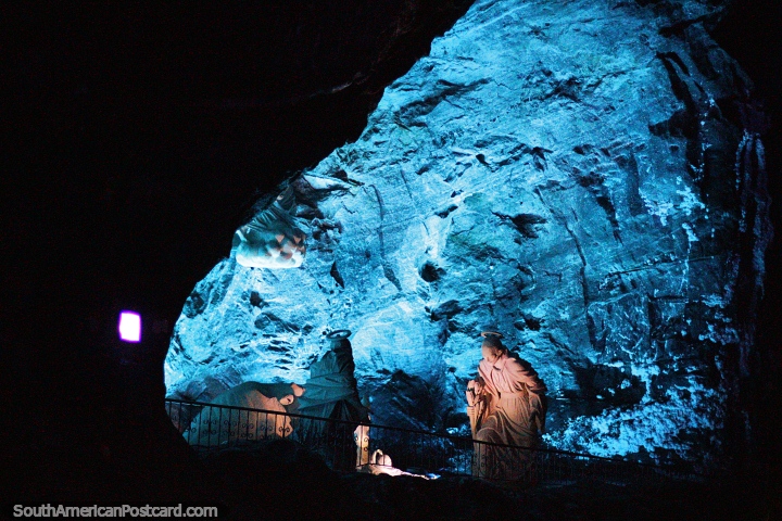 Just some of the colors the Holy Family sculpture is seen in, a nice blue light, Salt Cathedral in Zipaquira. (720x480px). Colombia, South America.