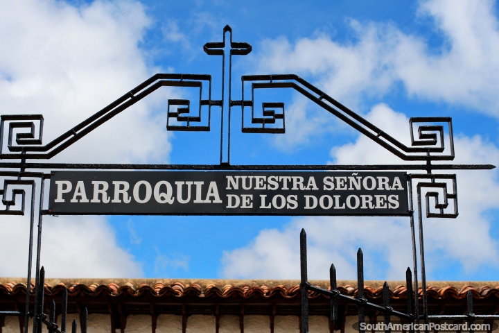 Sign for the church in Guatavita with an interesting metal design and shapes. (720x480px). Colombia, South America.