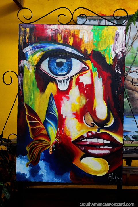 Teardrop from an eye and a rainbow of color, a painting at La Maloca Restaurant in Ricaurte near Girardot. (480x720px). Colombia, South America.