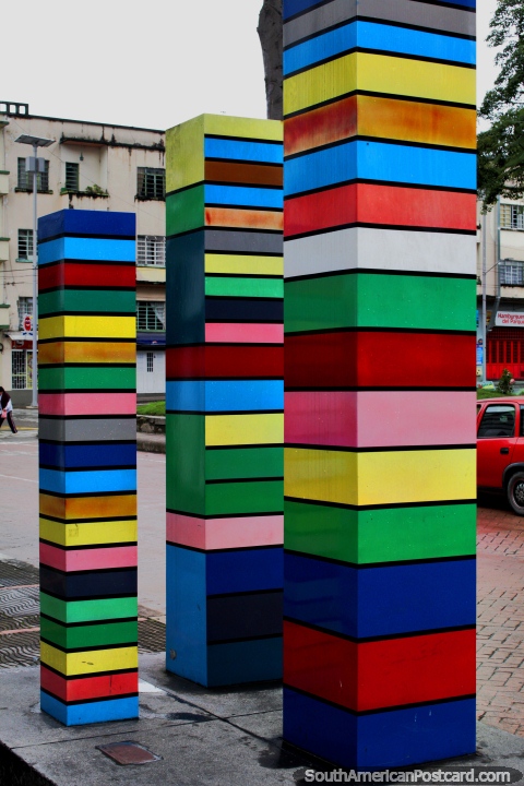 Columnas, a Korean artwork beside Plaza Bolivar in Ibague, 3 colorful columns. (480x720px). Colombia, South America.