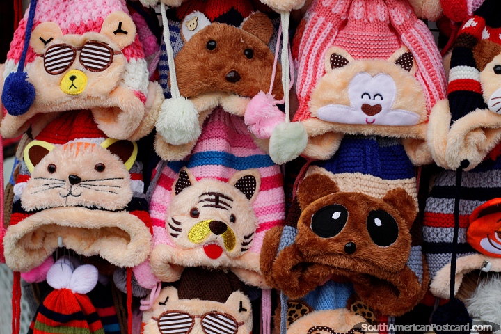 Woolen hats for children featuring animals such as bears and cats at the Arts and Crafts Fair in Ibague. (720x480px). Colombia, South America.
