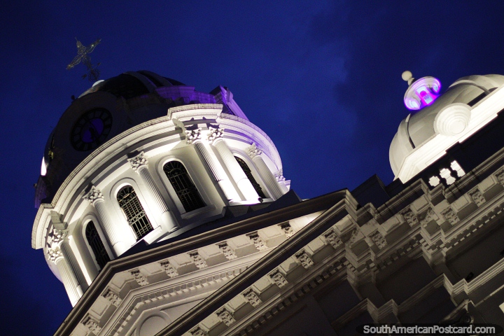 Dome of the Cali cathedral, glowing in the light of night at Cayzedo Plaza. (720x480px). Colombia, South America.