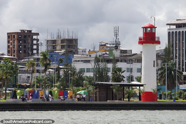 Lighthouse, city and waterfront in Buenaventura, view from a boat. (720x480px). Colombia, South America.