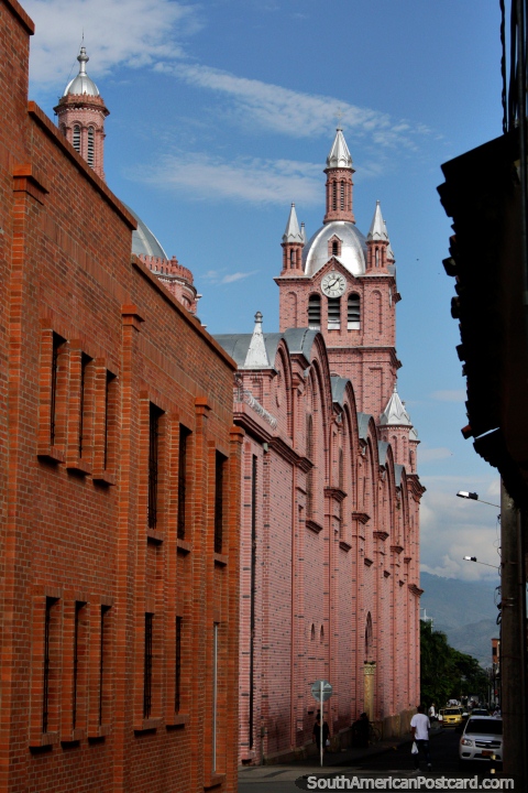 Famous red brick cathedral in Buga with clock tower - Lord of the Miracles Minor Basilica. (480x720px). Colombia, South America.