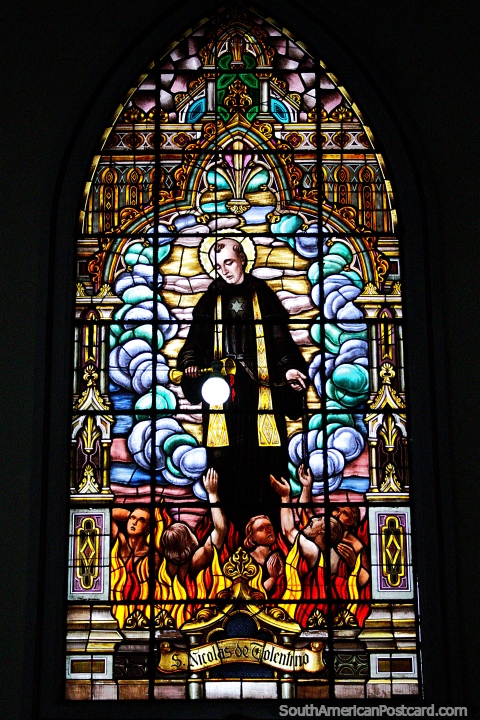 Saint Nicholas of Tolentino (c.1246-1305), stained glass window at Parroquia Los Agustinos, Manizales. (480x720px). Colombia, South America.