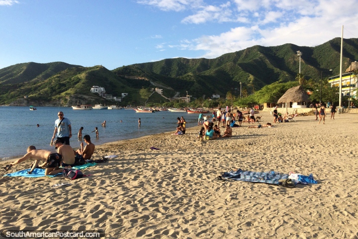 White sands of the beach in Taganga with green hills towards the east. (720x480px). Colombia, South America.