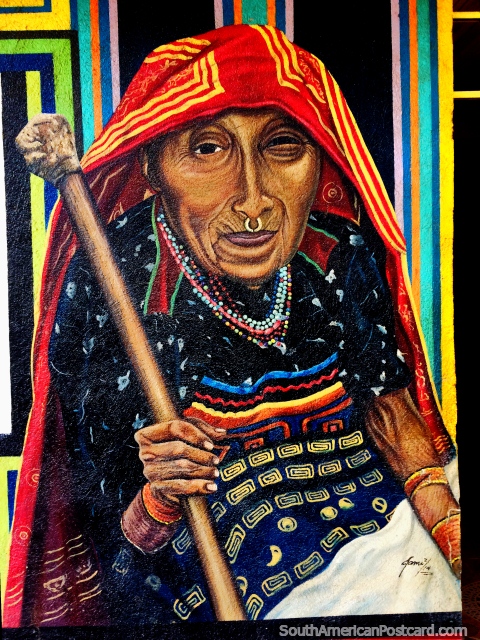 2nd mural of an old woman with pierced nose wearing a scarf and with a walking stick, Taganga. (480x640px). Colombia, South America.