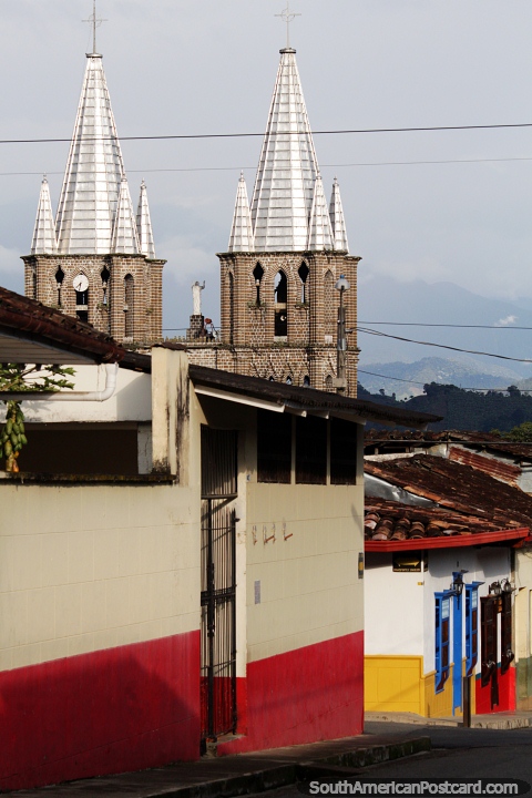 The iconic church in Jardin, 2 silver steeples, view from the streets above. (480x720px). Colombia, South America.