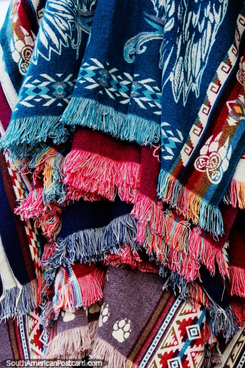 Shawls, colorful with nice designs, for sale in Jardin, stay warm at night. (480x720px). Colombia, South America.