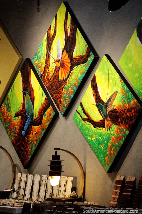 3 paintings of birds in an art shop in Salento, diamond shaped. (480x720px). Colombia, South America.