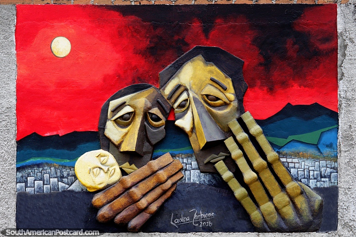 Arte tridimensional (2018) de Carolina Zambrano, 2 faces e mãos e um pôr do sol vermelho, Pasto. (720x480px). Colômbia, América do Sul.