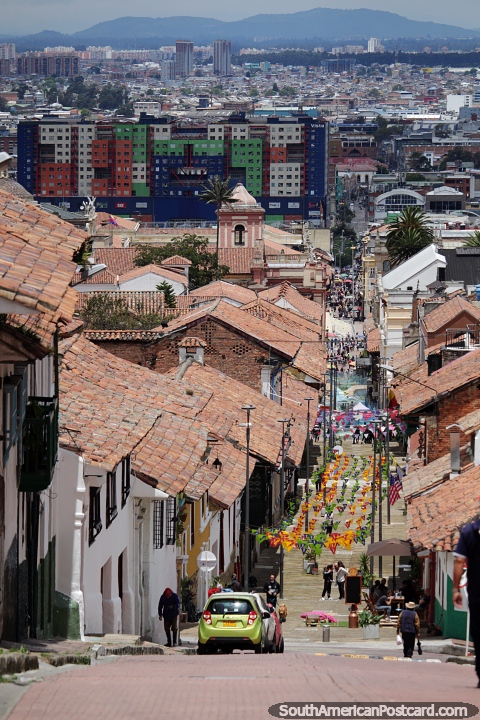 View from above red tiled roofs down to Plaza Bolivar in Bogota, stunning sight to see. (480x720px). Colombia, South America.