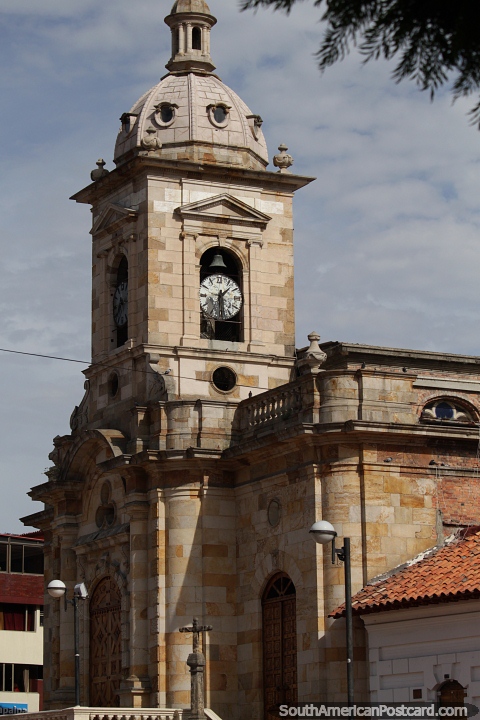 San Miguel Arcangel Church in Paipa with single clock and bell tower. (480x720px). Colombia, South America.