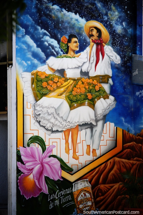 Hombre y mujer en trajes tradicionales bailando, gran mural en Neiva. (480x720px). Colombia, Sudamerica.