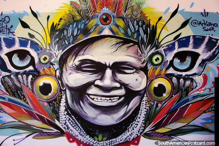 Mural of a smiling indigenous man at Caqueta Museum in Florencia. (720x480px). Colombia, South America.