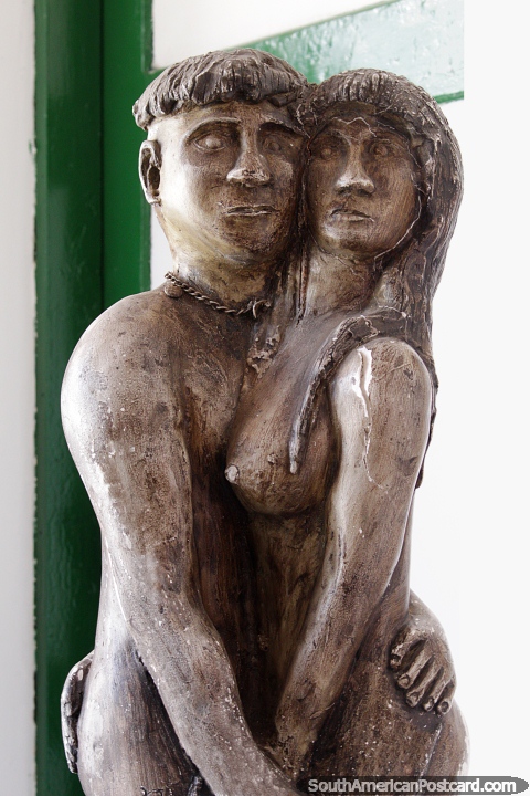 Sculpture of a man and woman, bronze or ceramic, Caqueta Museum in Florencia. (480x720px). Colombia, South America.