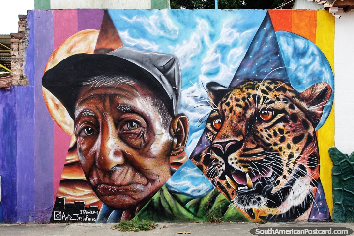 Homem e um tigre, grande arte de rua da Arte Jesus Parra em Villa del Rosario, Cucuta. (720x480px). Colômbia, América do Sul.