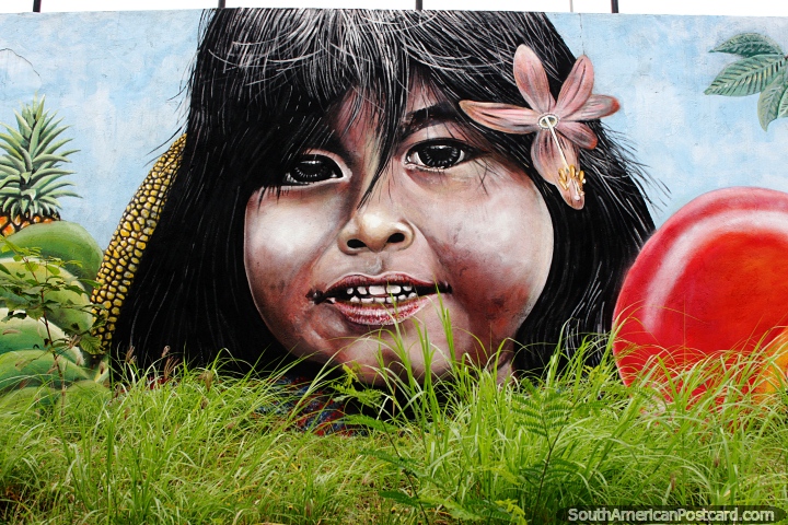 Young girl with a pink flower in her hair, mural by Arte Jesus Parra in Cucuta. (720x480px). Colombia, South America.