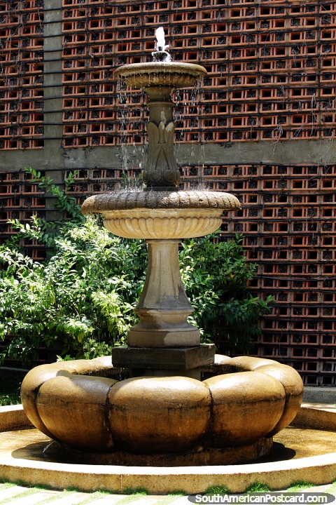 Beautiful stone fountain at Bolivar House in Bucaramanga, a special place of interest. (480x720px). Colombia, South America.